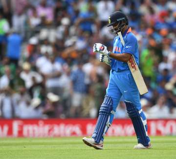 Shikhar Dhawan of India leaves the field