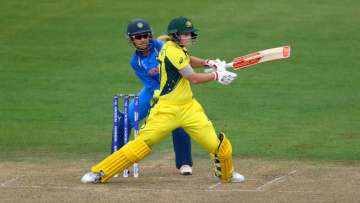 Sushma Verma looks on as Australia's Meg Lanning hits a shot