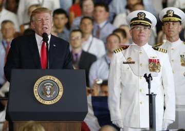 Trump puts the USS Gerald Ford into commission at Naval Station Norfolk 