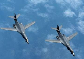 Beijing cautions US after two if its bombers fly over South China Sea 