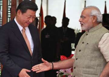 File pic of Xi Jinping and Narendra Modi 