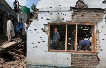 House destroyed during encounter between forces and militants in Pulwama