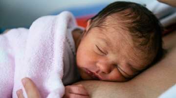 mumbai baby born pregnant with brother