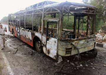 New Delhi: A DTC bus set on fire by followers Gurmeet Ram Rahim