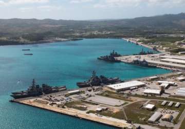 File Navy vessels moored in port at the U.S. Naval Base at Apra Harbor, Guam