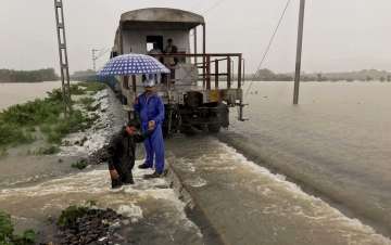  A goods train halts on the flooded tracks in Bihar's Katihar
