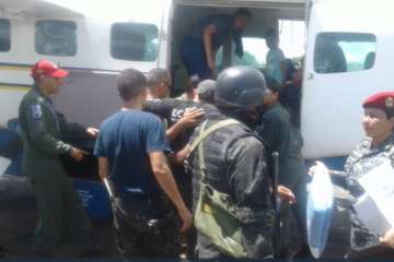 37 die in clash between inmates, police at Venezuelan prison