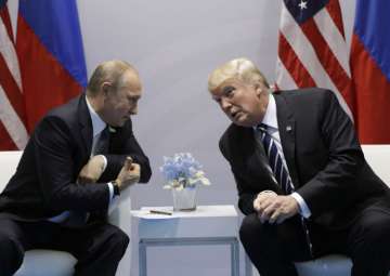 File pic - Vladimir Putin and Donald Trump 