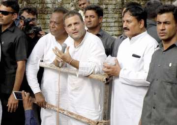 File pic - Rahul Gandhi interacts with the flood affected people of Runi village