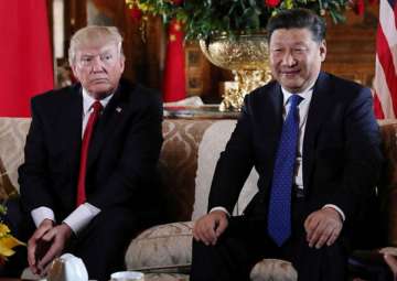 File pic of Donald Trump and Xi Jinping 