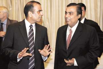 File photo of Airtel chief Sunil Mittal with RIL chairman Mukesh Ambani