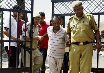 Gurugram student murder: Bus conductor Ashok Kumar being escorted by police
