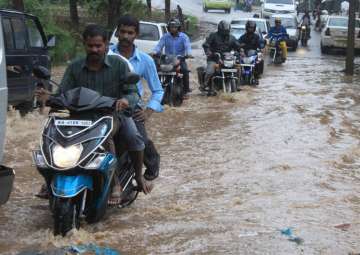 Motorists struggle through water logged streets of Bengaluru after heavy rains