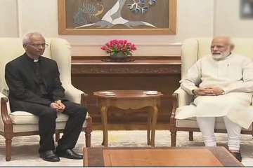 Father Tom Uzhannalil meets PM Narendra Modi.