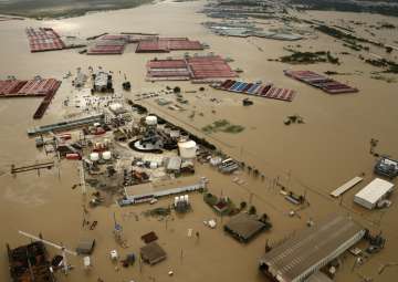 File pic - Flood-swollen Burnet Bay along the Houston Ship Channel in Houston