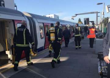 Manhunt on after terror attack hit London Tube train 