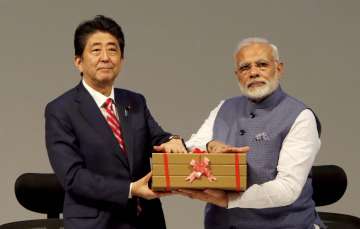PM Modi and PM Abe inaugurate Suzuki's Gujarat vehicle manufacturing plant 