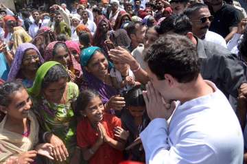 Rahul Gandhi greets locals during his three-day visit to Gujarat