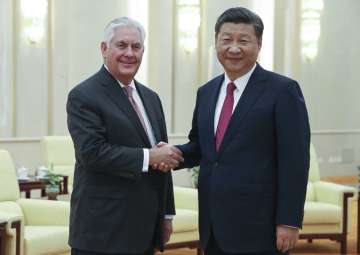 Rex Tillerson shakes hands with Xi Jinping at the Great Hall of the People