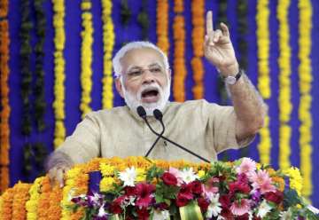 PM Modi slams UPA over health policy 