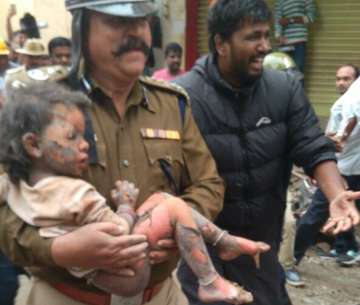 Child rescued from rubble will be adopted by Karnataka government