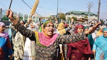 Women protest against incidents of braid-chopping in Srinagar. 