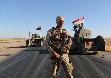 Iraq halts troops tasked to retake land from Kurdish control