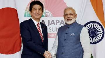 File photo of Shinzo Abe with Prime Minister of India Narendra Modi. 