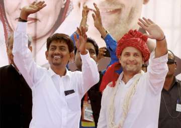 Rahul Gandhi with Alpesh Thakor who during a public meeting in Gandhinagar