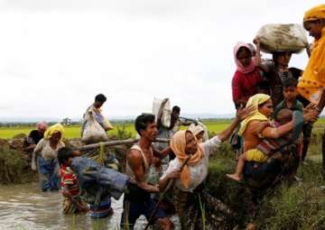 File pic - A group of Rohingya refugees after crossing the Bangladesh-Myanmar border