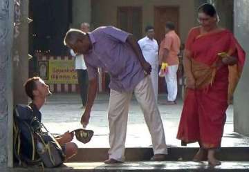 Sushma Swaraj helps Russian tourist begging outside TN temple