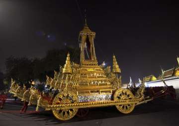 The royal officials pull to the royal chariot used to carry the body and the royal urn of the late Thai King Bhumibol Adulyadej