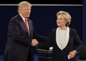 File pic - Donald Trump dares Hillary Clinton to run in 2020 presidential polls 