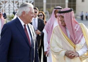 Secretary of State Rex Tillerson speaks with Saudi Foreign Minister Adel Ahmed Al-Jubeir in Riyadh