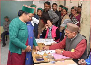 A woman casting her vote in Kinnaur