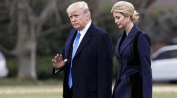 President Donald Trump, accompanied by his daughter Ivanka. AP photo