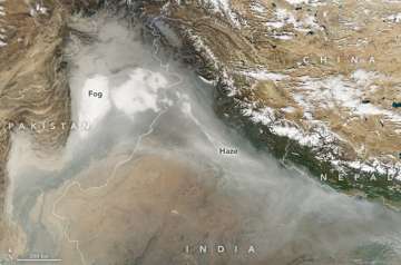 Moderate Resolution Imaging Spectroradiometer (MODIS) on NASA’s Aqua satellite captured this natural-color image of haze and fog on November 7