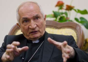 Archbishop Silvano Maria Tomasi speaks to The Associated Press during an interview in Rome