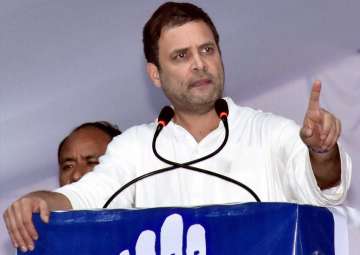 Rahul Gandhi addresses during a public meet for gujarat elections campaign at Varachha in Surat on Friday