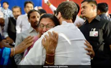 PhD holder Ranjana Avasthi hugs Congress vice-preisdent Rahul Gandhi.