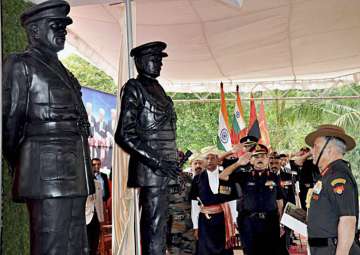 General Bipin Rawat paying tribute at the newly unveiled statues of Field Marshal KM Cariappa and General KS Thimayya