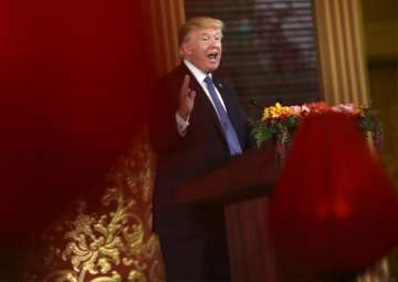 Donald Trump delivers a speech during a state dinner with Chinese President Xi Jinping at the Great Hall of the People