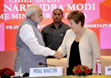 PM Modi shakes hands World Bank CEO Kristalina Georgieva at a session on India’s Business Reforms in New Delhi