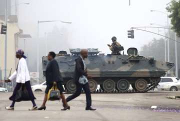Zimbabwe’s army said Wednesday it has President Robert Mugabe and his wife in custody and is securing government offices and patrolling the capital’s streets following a night of unrest that included a military takeover of the state broadcaster. 