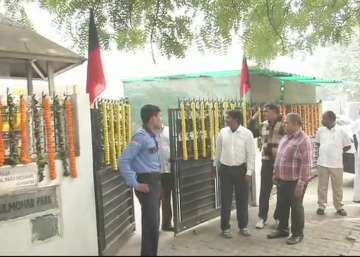 DMK supporters were seen bursting fire crackers outside the court complex and showered Raja and Kanimozhi with flowers as soon as they stepped out of court.