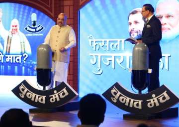  India TV Chairman and Editor-in-Chief Rajat Sharma grills BJP president Amit Shah at India TV's Chunav Manch in Ahmedabad.