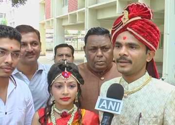 A newly-married couple was centre of attraction as they arrived to cast their vote.