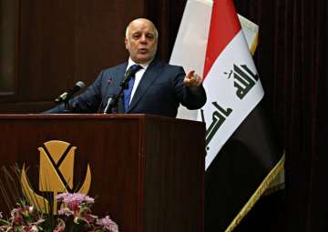 Iraq PM Haider al-Abadi gestures said that war against Islamic State is over after more than three years of combat operations