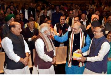 Rajnath Singh, PM Modi, Amit Shah and Ananth Kumar at the BJP parliamentary meeting.