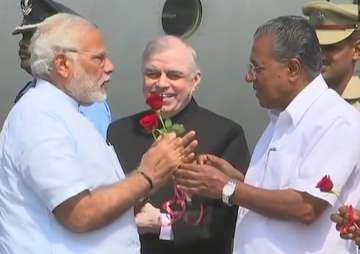 PM Modi received by Kerala CM Vijayan in Trivandrum on visit Cyclone Ockhi affected areas